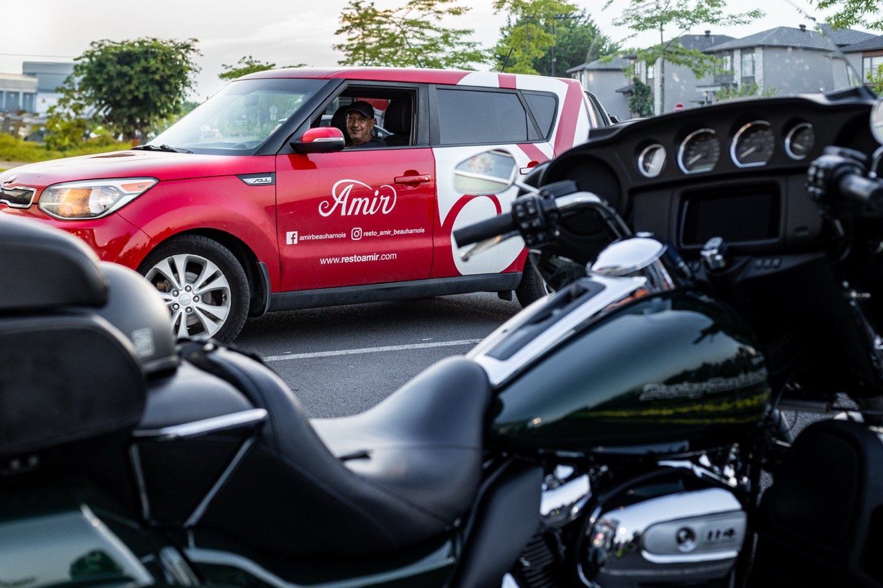 A close-up of a red motorcycle's engine and details.