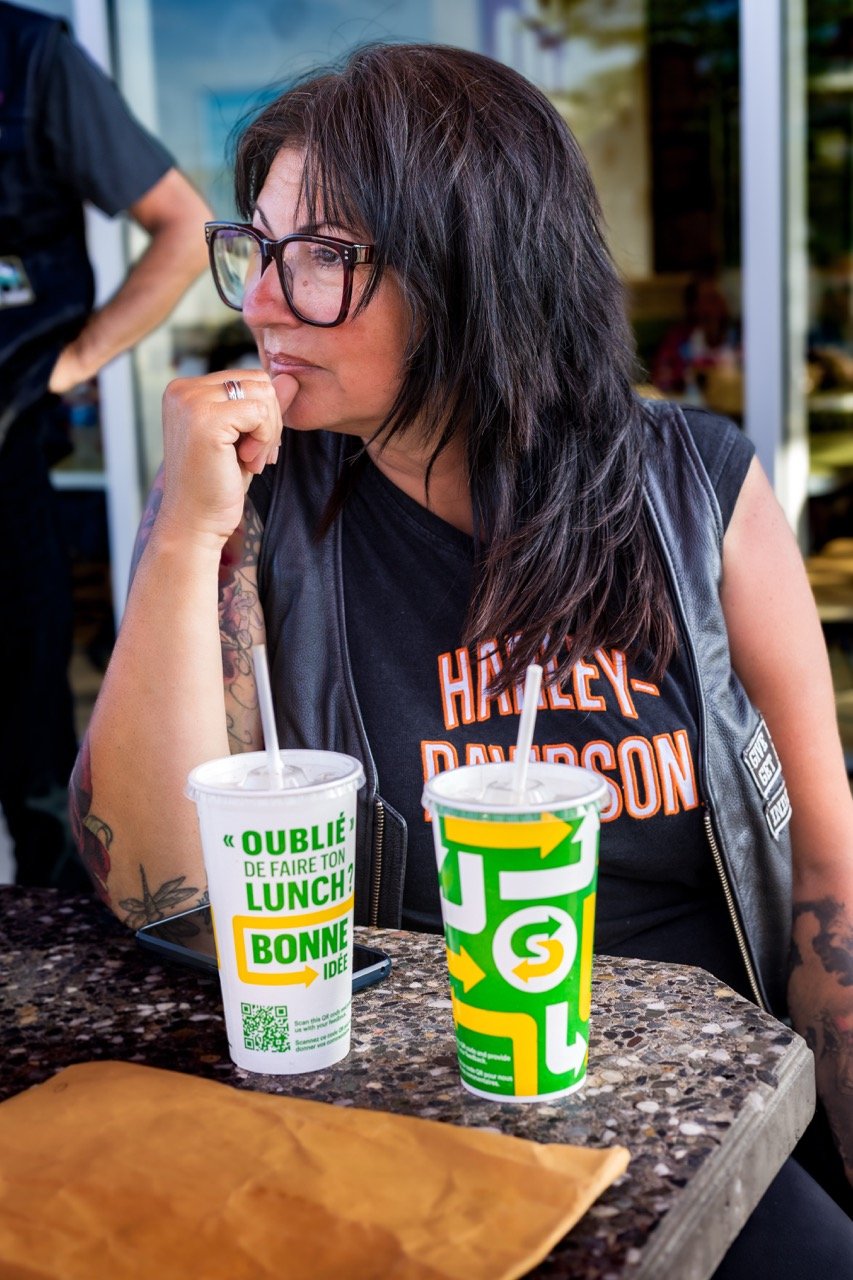 An attendee enjoying a drink at the event.