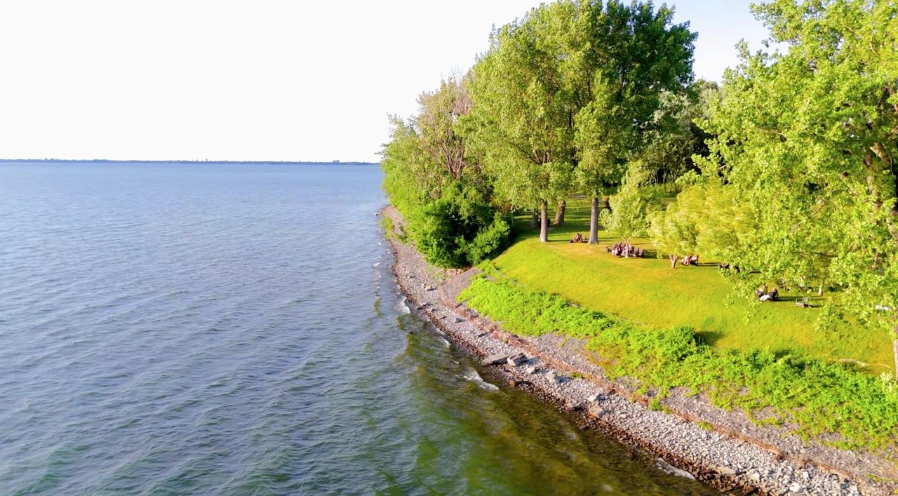 Aerial shot of a public park with walking paths.