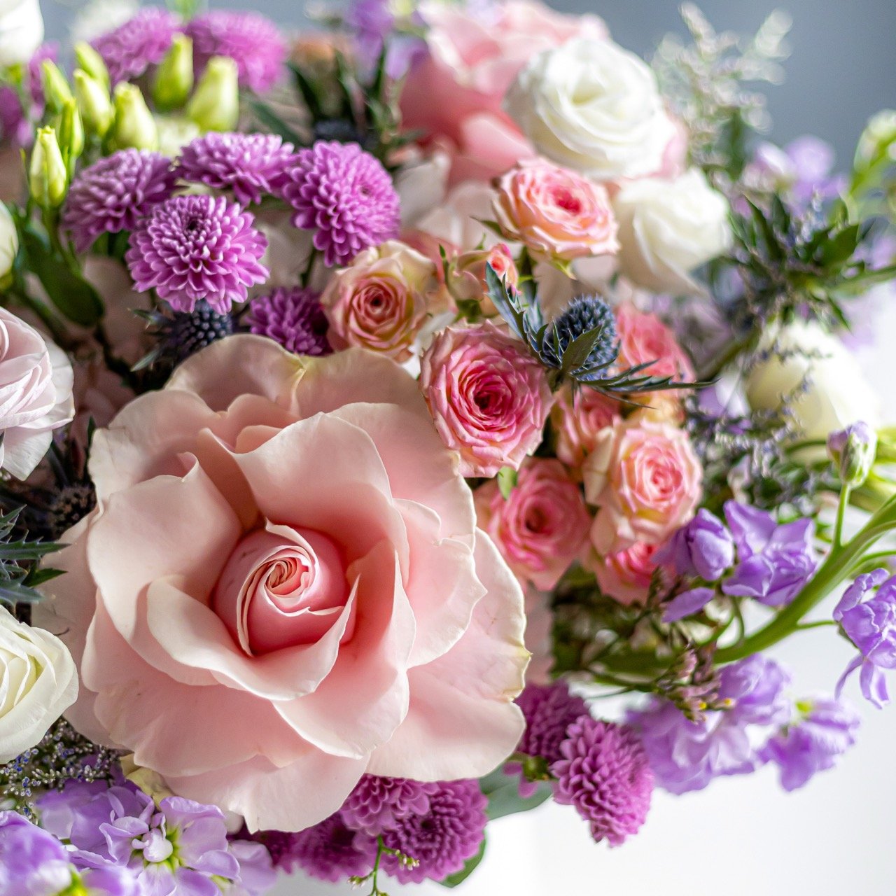 Still Life Photo of a pink and purple bouquet.