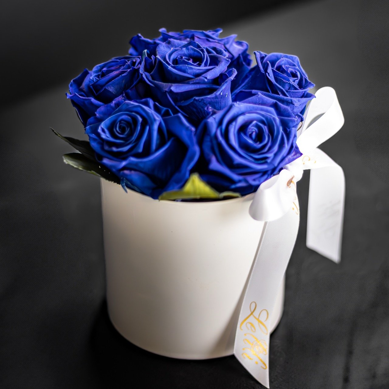 Still Life Photo of blue roses.